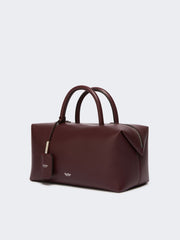 Medium natural leather bowler bag - Bordeaux