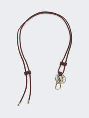 Leather Monogram strap with pendant detail - Bordeaux