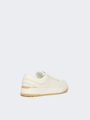 Low-top trainers in tumbled leather - White