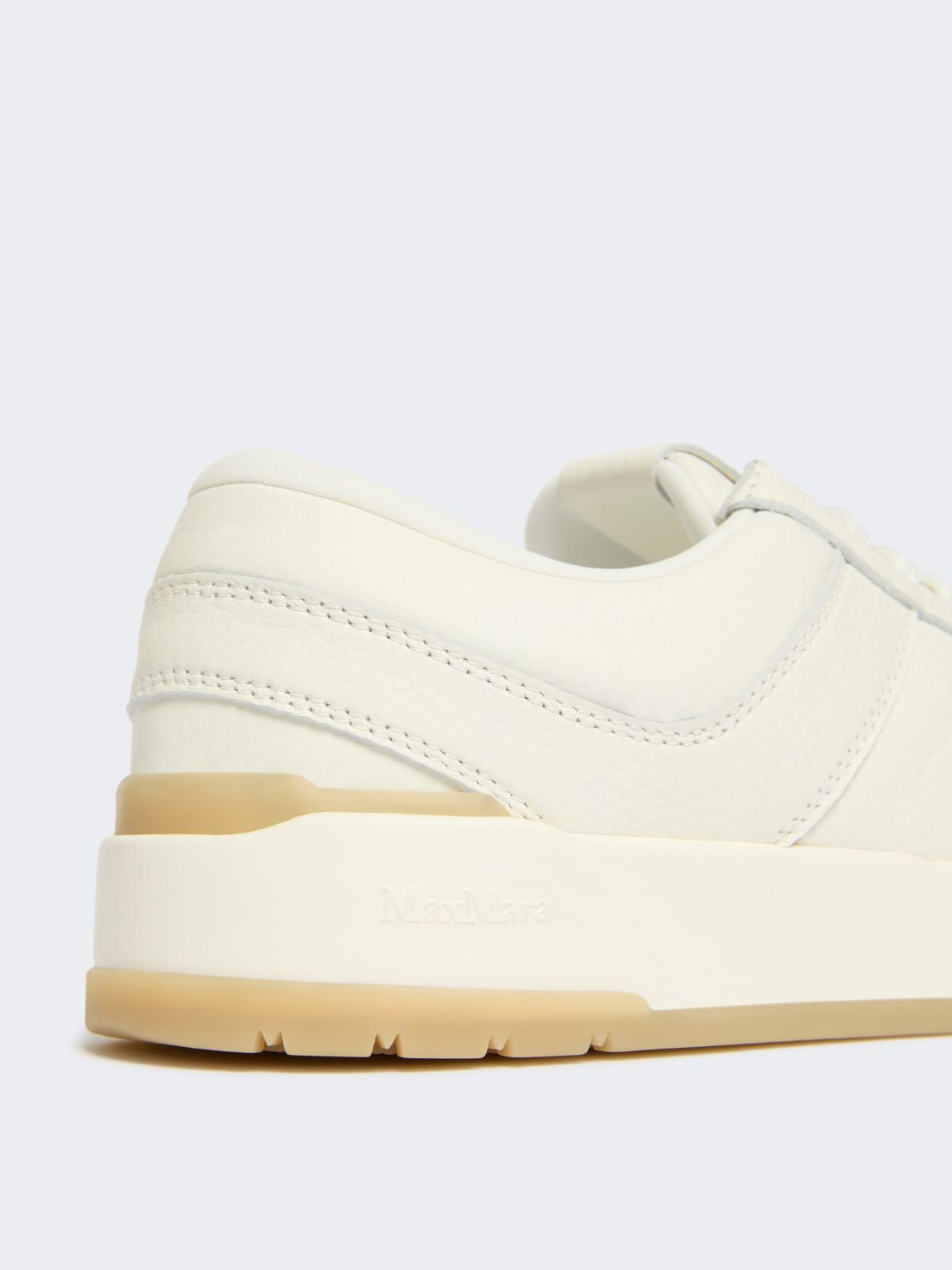 Low-top trainers in tumbled leather - White