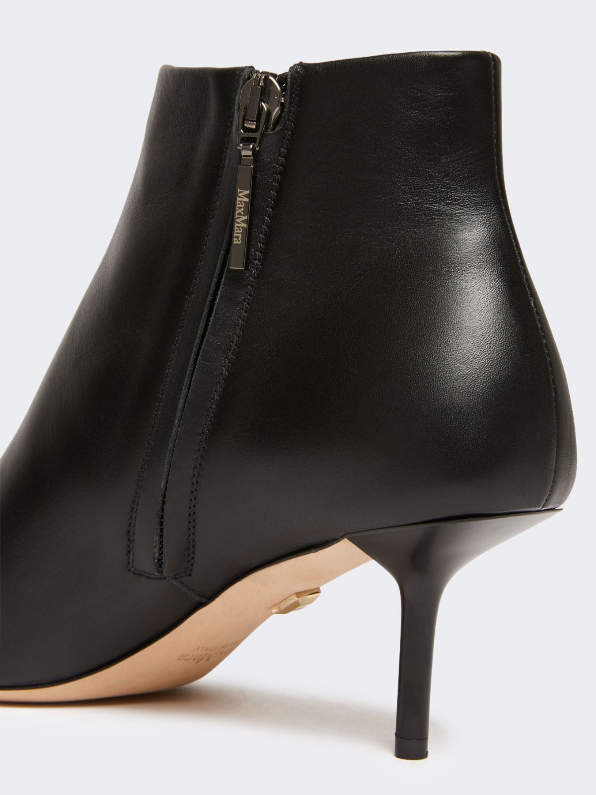 Zip-up leather ankle boots - Black